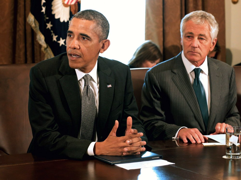 U.S. President Barack Obama makes briefs remarks to the news media at the beginning of a cabinet meeting with Defense Secretary Chuck Hagel in the Cabinet Room of the White House, September 12, 2013 in Washington, D.C.