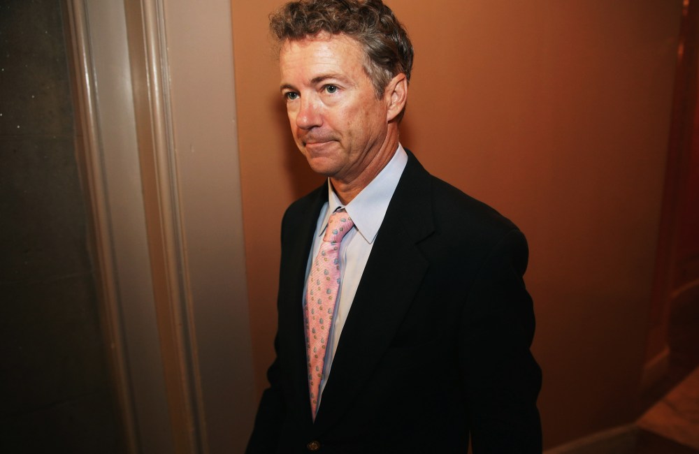 Sen. Rand Paul leaves a Republican Senate caucus meeting, September 30, 2013 in Washington, DC.