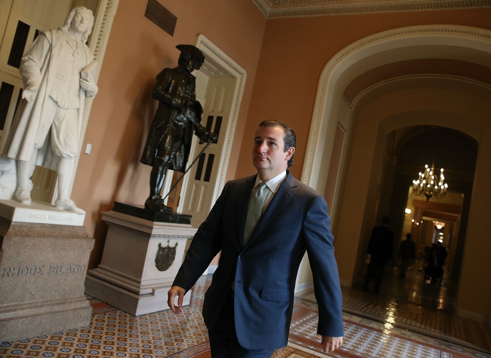 Sen. Ted Cruz (R-TX) walks through the U.S. Capitol, October 3, 2013 in Washington, DC.