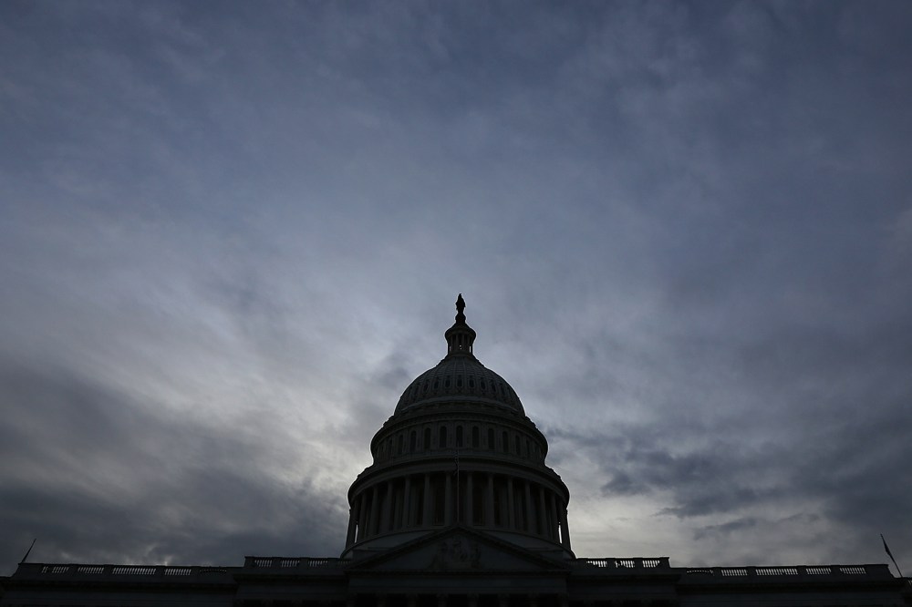 The U.S. Capitol is shown at sunset in Washington, D.C.