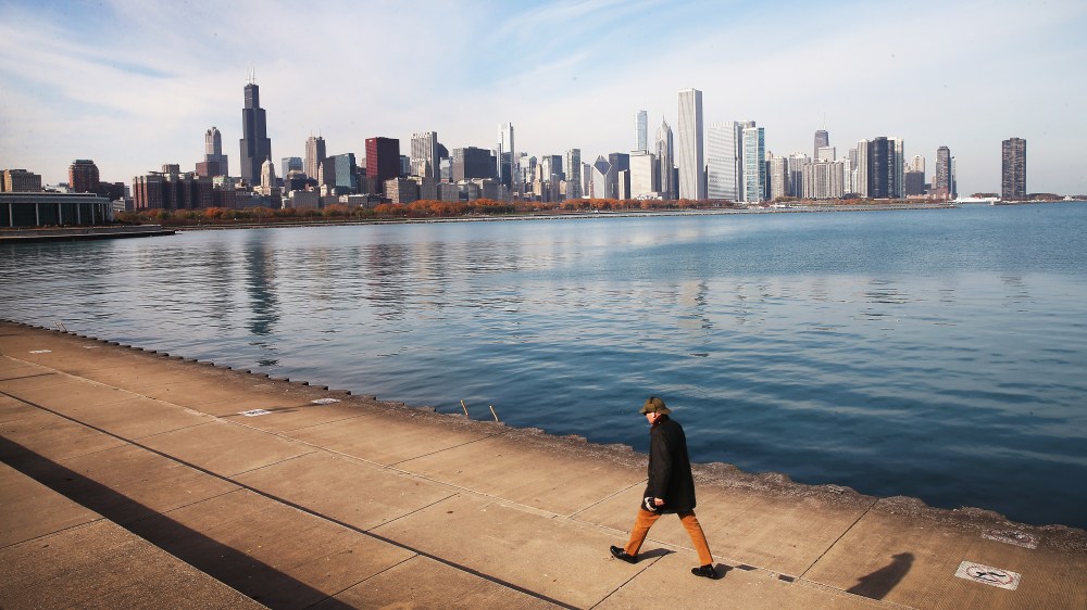 The Willis Tower (L), which was formerly Sears Tower, rises above the city's skyline on November 8, 2013 in Chicago, Illinois.