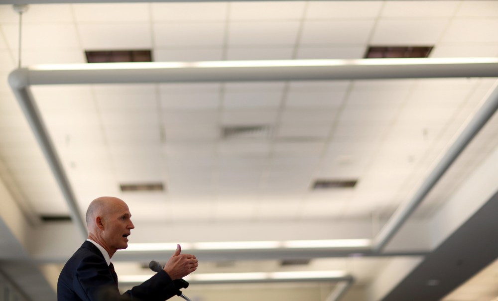 Florida Governor Rick Scott gives a speech during a meeting at PortMiami on November 12, 2013 in Miami, Florida.