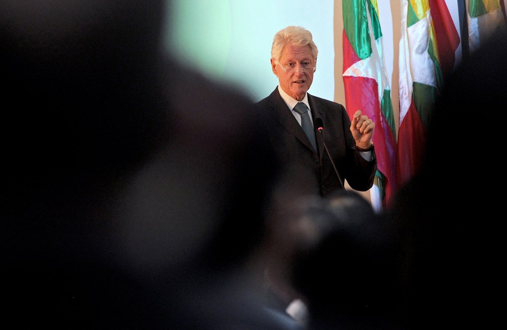 Former US President Bill Clinton talks in Yangon on November 14, 2013.