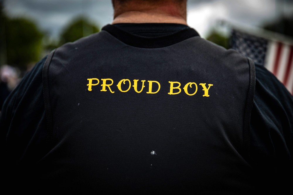 A man wears a Proud Boy vest as several hundred members of the Proud Boys and other similar groups gathered at Delta Park in Portland, Oregon on September 26, 2020. - Far-right group "Proud Boys" members gather in Portland to show support to US president Donald Trump and to condemn violence that have been occurring for more than three months during "Black Lives Matter" and "Antifa" protests.