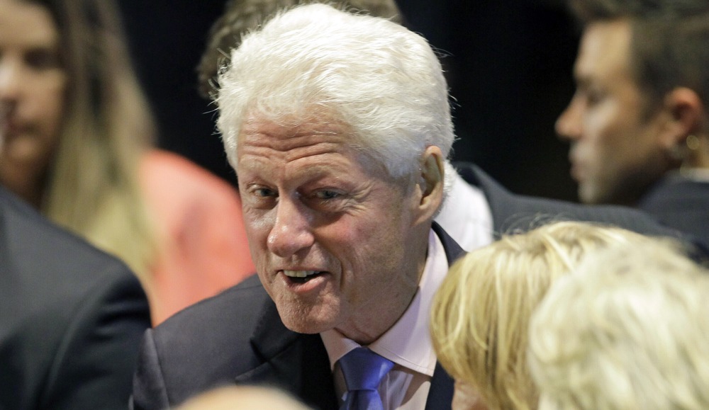 Former President Bill Clinton greets supporters after speaking at a campaign event, Wednesday, Sept. 12, 2012, in Orlando, Fla., as he campaigns for President Barack Obama.