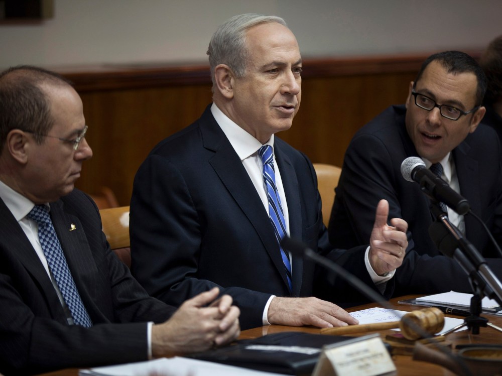 Israel's Prime Minister Benjamin Netanyahu (C) attends the weekly cabinet meeting in Jerusalem February 10, 2013. Iran's nuclear ambitions, the civil war in Syria and stalled Israeli-Palestinian peace efforts will top the agenda of U.S. President...