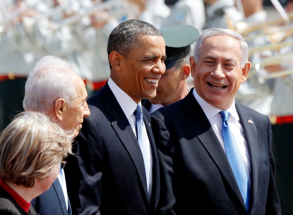 U.S. President Barack Obama walks with Israeli Prime Minister Benjamin Netanyahu (R) and President Shimon Peres upon his arrival at Ben Gurion International Airport in Tel Aviv March 20, 2013. Obama said at the start of his first official visit to...