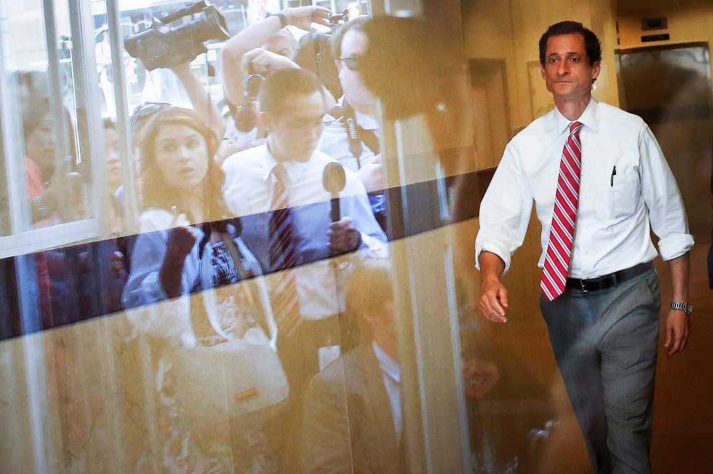 Anthony Weiner leaves a campaign stop in the Queens borough of New York, July 29, 2013.