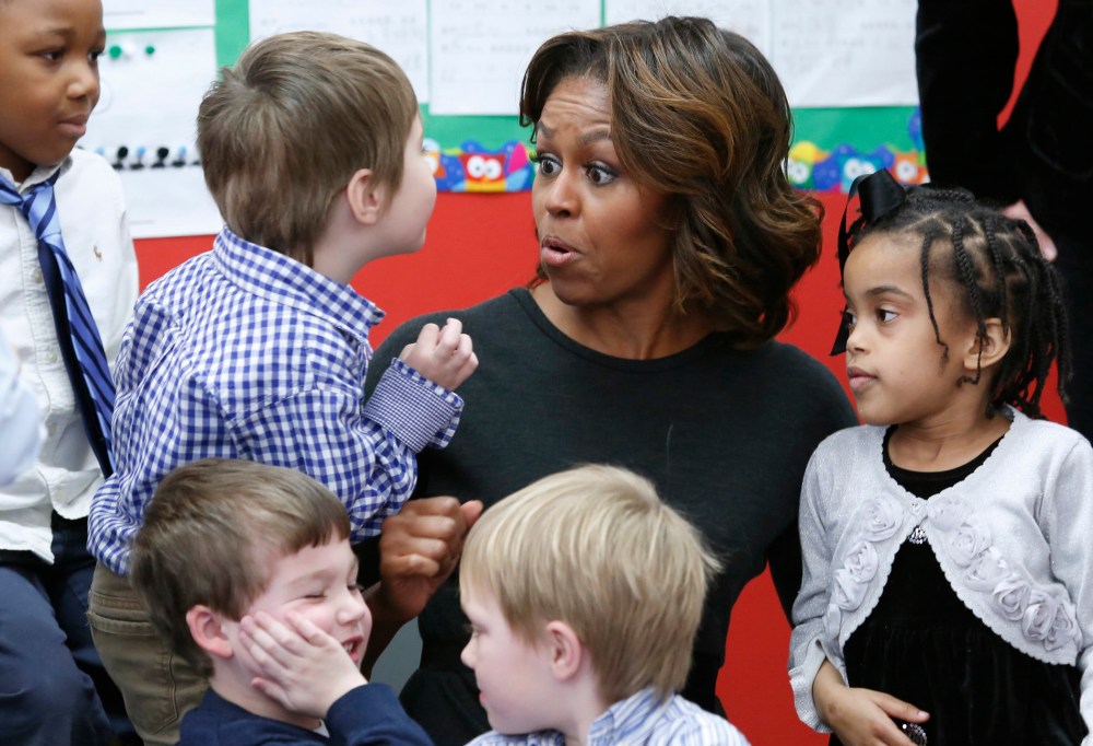 First lady Michelle Obama meets pre-school students in Washington, March 4, 2014.