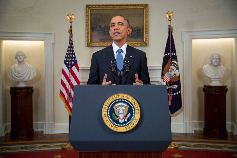 U.S. President Barack Obama announces a shift in policy toward Cuba while delivering an address to the nation from the Cabinet Room of the White House in Washington, on Dec. 17, 2014. (Photo by Doug Mills/Pool/Reuters)