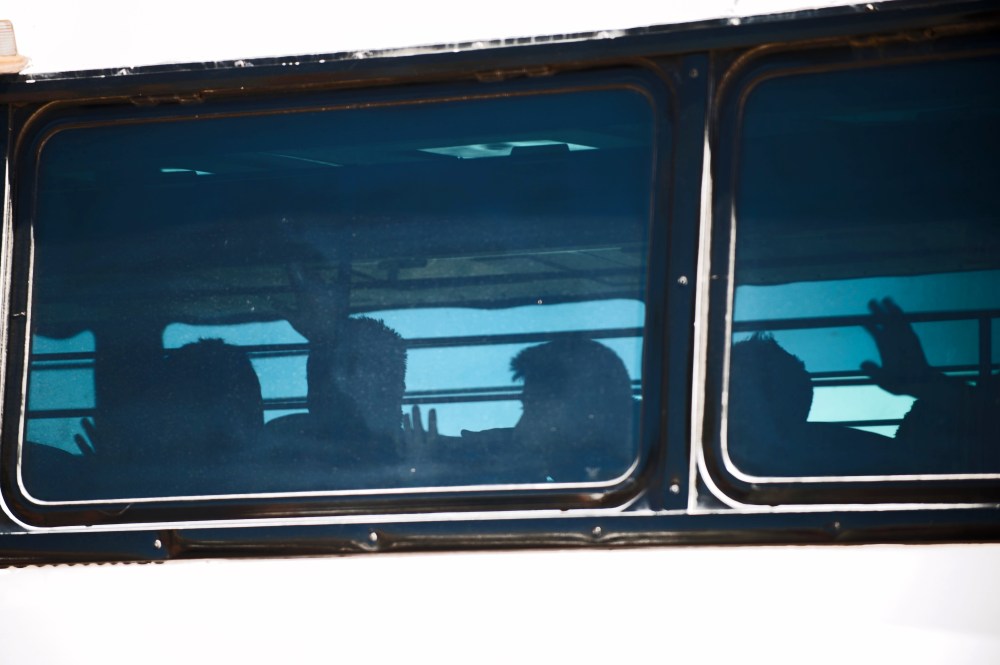 Young undocumented immigrants leave a Border Patrol facility. The U.S. Border Patrol holds hundreds of undocumented unaccompanied minors and women in a detention facility in Nogales, Ariz., June 7, 2014.