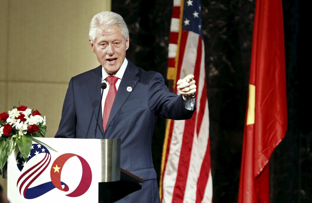 Former U.S. President Bill Clinton speaks at an event celebrating the 239th anniversary of the U.S. Independence Day in Hanoi