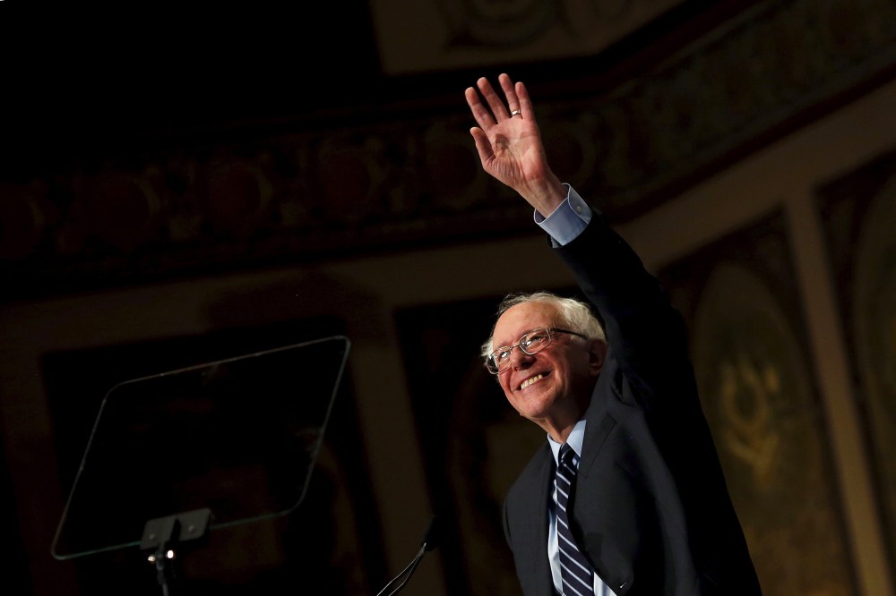 Democratic presidential candidate Bernie Sanders waves after delivering a speech to students at Georgetown University's Gaston Hall in Washington, D.C., on Nov. 19, 2015. (Photo by Carlos Barria/Reuters)