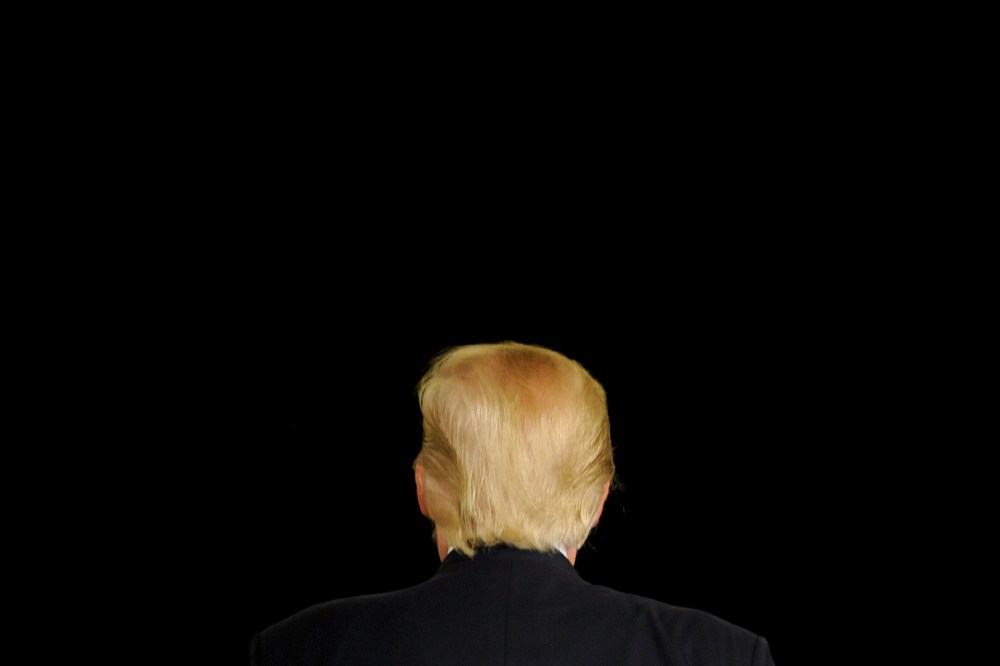 Republican U.S. presidential candidate Donald Trump turns away from the cameras as he speaks at a town hall event in Appleton, Wis., March 30, 2016. (Photo by Mark Kauzlarich/Reuters)