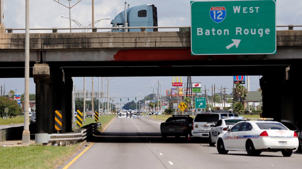 Police officers block off a road after a shooting of police in Baton Rouge, Louisiana,  July 17, 2016. (Photo by Joe Penny/Reuters)