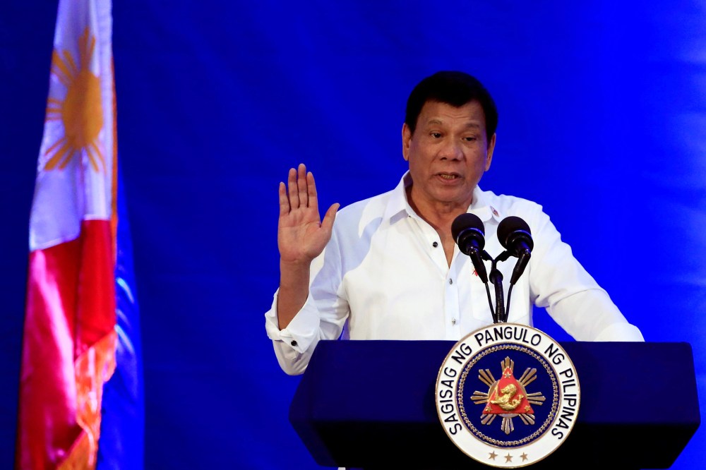 Philippine President Rodrigo Duterte gestures while delivering a speech during the 80th National Bureau of Investigation (NBI) founding anniversary at the NBI headquarters in metro Manila, Philippines on Nov. 14, 2016. (Photo by Romeo Ranoco/Reuters)