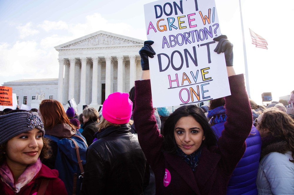 Demonstrators assembled in front of the Supreme Court steps in Washington D.C. on March 2, 2016 as the Court heard oral arguments in the Whole Woman's Health v. Hellerstedt case. (Photo by Jeff Malet/Newscom/ZUMA)