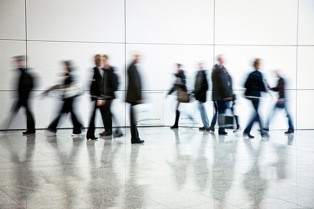 Commuters Walking in Corridor, Blurred Motion