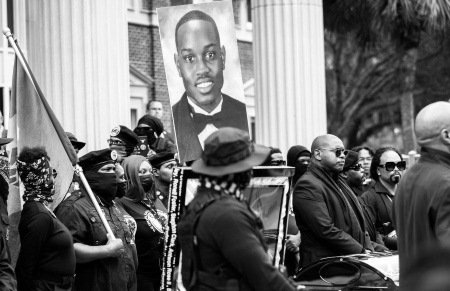 Dozens of Black Lives Matter and Black Panther protesters gather on November 22 outside the Glynn County Courthouse in Brunswick, Georgia where the trial of Travis McMichael, Gregory McMichael, and William 