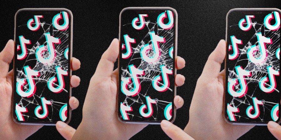 Photo Illustration: A hand holds a shattered iPhone screen as TikTok loads