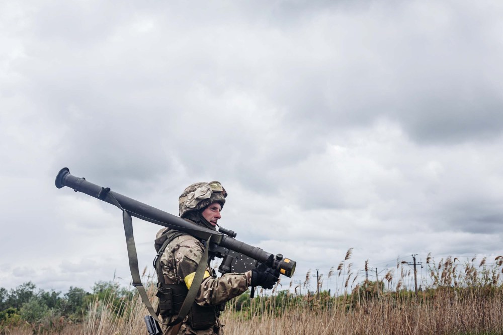 A Ukrainian soldier is seen with an anti-aircraft weapon in Donetsk Oblast, Ukraine