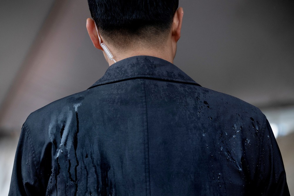 A member of the Secret Service stands guard as US President Joe Biden attends an event at Veterans Memorial Park in New Castle, Del. on May 30, 2021.