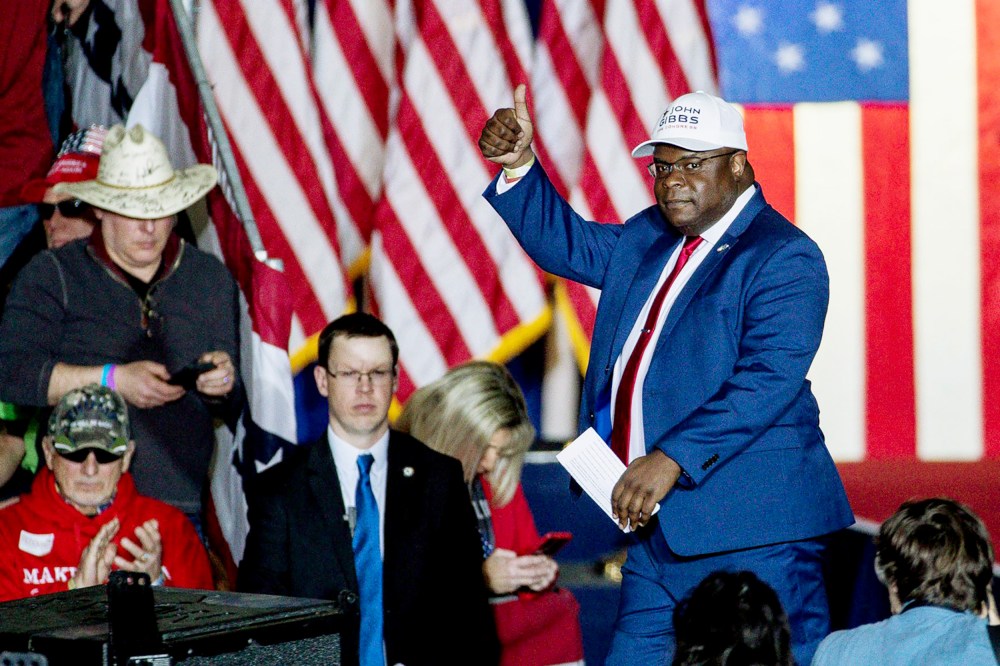 Republican House of Representative candidate John Gibbs speaks during a Save America rally at the Michigan Stars Sports Center in Washington Township on April 2.