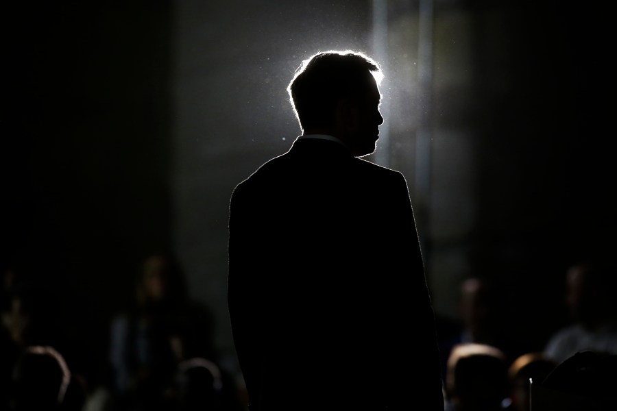 CHICAGO, IL - JUNE 14: Engineer and tech entrepreneur Elon Musk of The Boring Company listens as Chicago Mayor Rahm Emanuel talks about constructing a high speed transit tunnel at Block 37 during a news conference on June 14, 2018 in Chicago, Illinois. Musk said he could create a 16-passenger vehicle to operate on a high-speed rail system that could get travelers to and from downtown Chicago and O'hare International Airport under twenty minutes, at speeds of over 100 miles per hour.