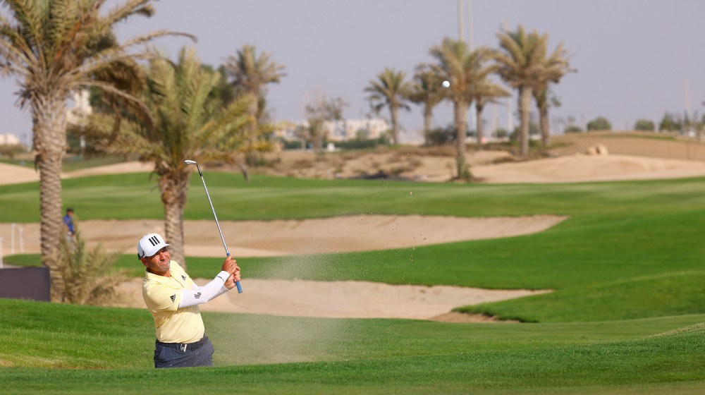 Image: Team Captain Sergio Garcia of Fireballs GC plays from a bunker in King Abdullah Economic City, Saudi Arabia