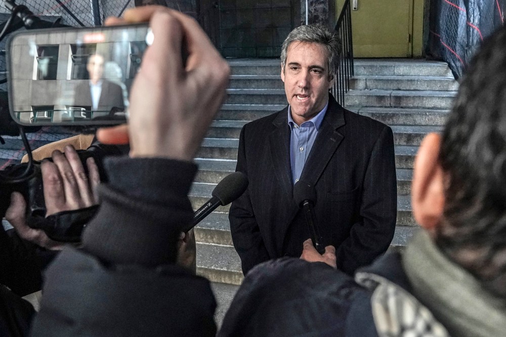 Michael Cohen briefs reporters after meeting with Manhattan prosecutors on Feb. 8, 2023.