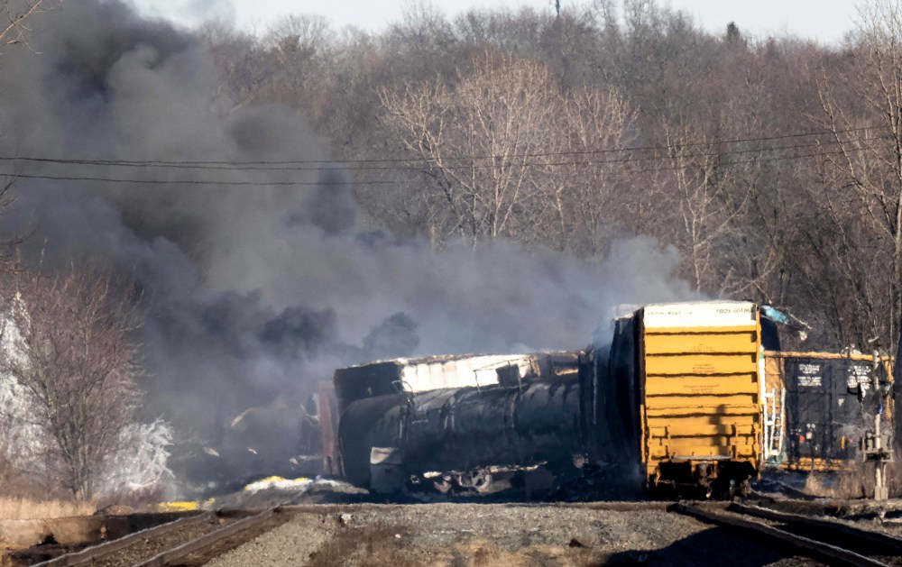 Smoke rises from a derailed cargo train in East Palestine, Ohio, on Feb. 4, 2023.