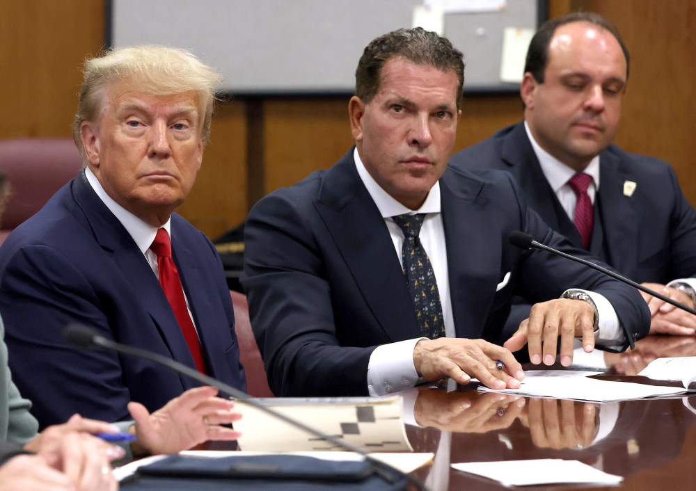 NEW YORK, NY - APRIL 04: Former U.S. President Donald Trump sits with his attorneys Joe Tacopina and Boris Epshteyn inside the courtroom during his arraignment at the Manhattan Criminal Court April 4, 2023 in New York City. Trump pleaded not guilty to 34 felony counts stemming from hush money payments made to adult film star Stormy Daniels before the 2016 presidential election. With his indictment, Trump will become the first former U.S. president in history to be charged with a criminal offense.