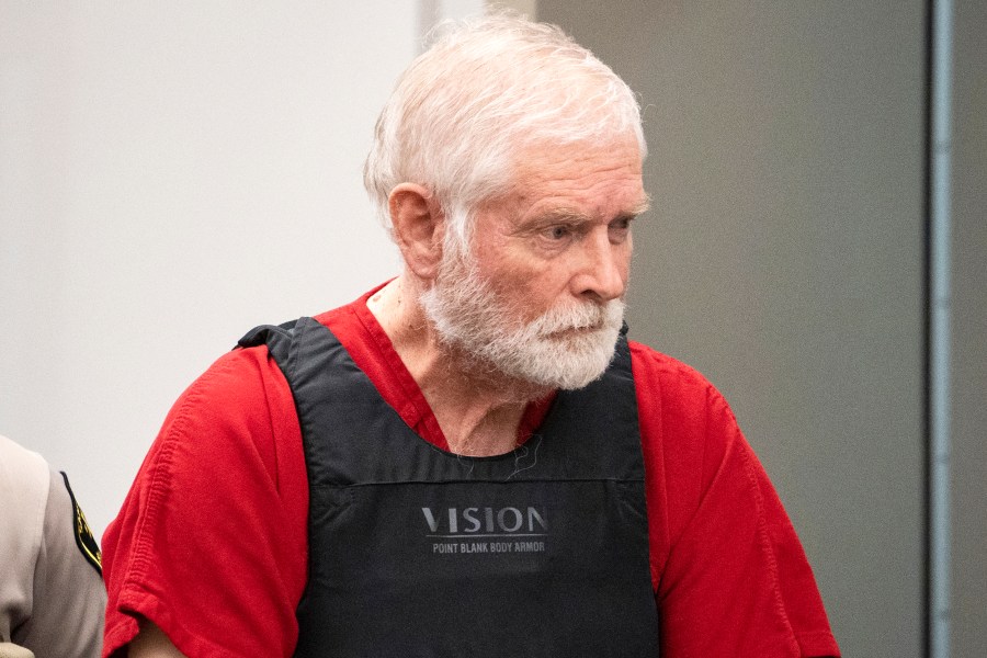 George Alan Kelly enters court for his preliminary hearing in Nogales Justice Court in Nogales, Ariz., Wednesday, Feb. 22, 2023. Kelly, faces a first-degree murder charge in the fatal shooting of Gabriel Cuen-Butimea, who lived just south of the border in Nogales, Mexico.