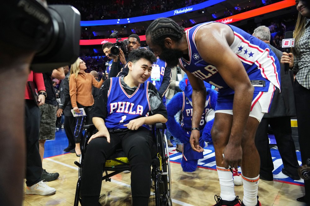 James Harden #1 of the Philadelphia 76ers and John Hao after Game Four of the Eastern Conference Semi-Finals of the 2023 NBA Playoffs against the Boston Celtics on May 7, 2023 at the Wells Fargo Center in Philadelphia, Pennsylvania.