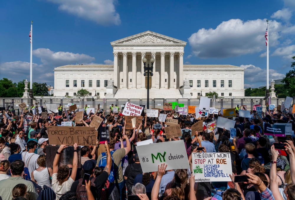 Abortion rights and anti-abortion demonstrators gather outside of the Supreme Court