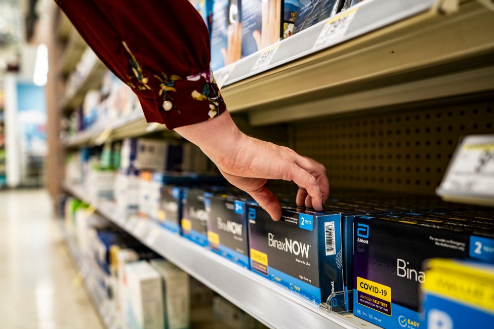 A shopper reaches for a box of Covid-19 tests in Dallas on Sept. 29, 2022.