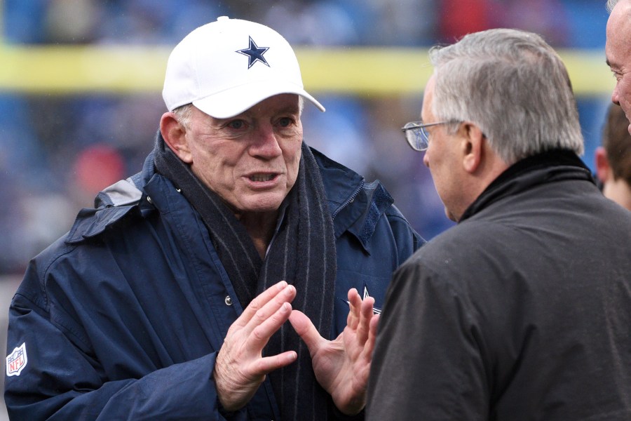 Buffalo Bills owner Terry Pegula, right, talks to Dallas Cowboys owner Jerry Jones prior to an NFL football game, Sunday, Dec. 27, 2015, in Orchard Park, N.Y.