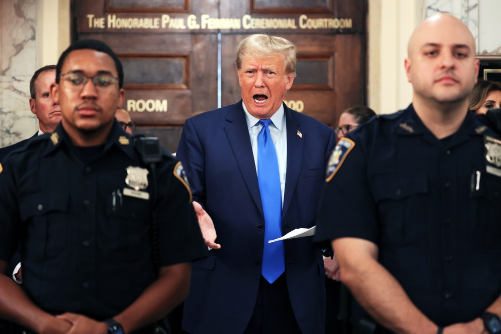 Donald Trump speaks while the court takes a lunch recess during the first day of his civil fraud trial at New York State Supreme Court on Oct. 2, 2023.
