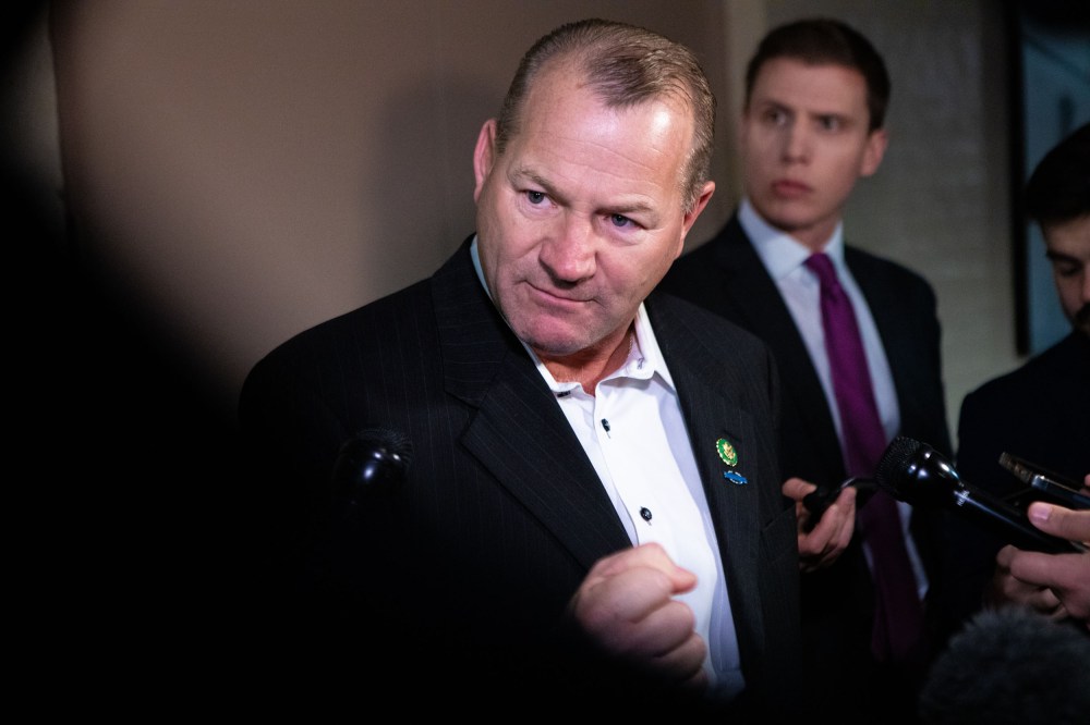 Rep. Troy Nehls (R-TX) speaks to reporters upon arrival to a House Republican Conference meeting on Nov. 14, 2023 in Washington, D.C..