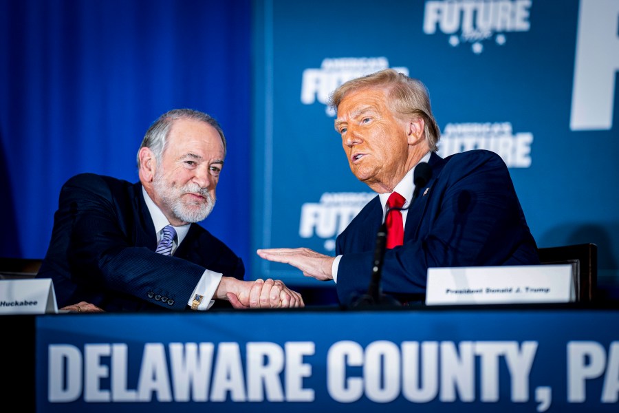 Mike Huckabee and Donald Trump.