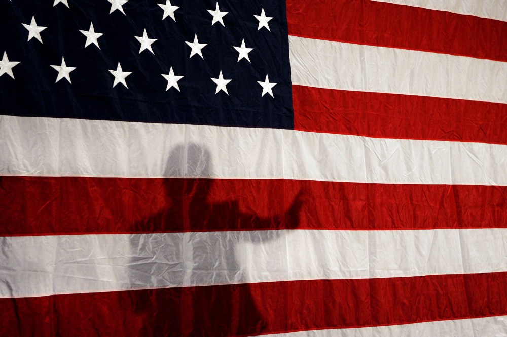 Shadow of a political candidate on a flag