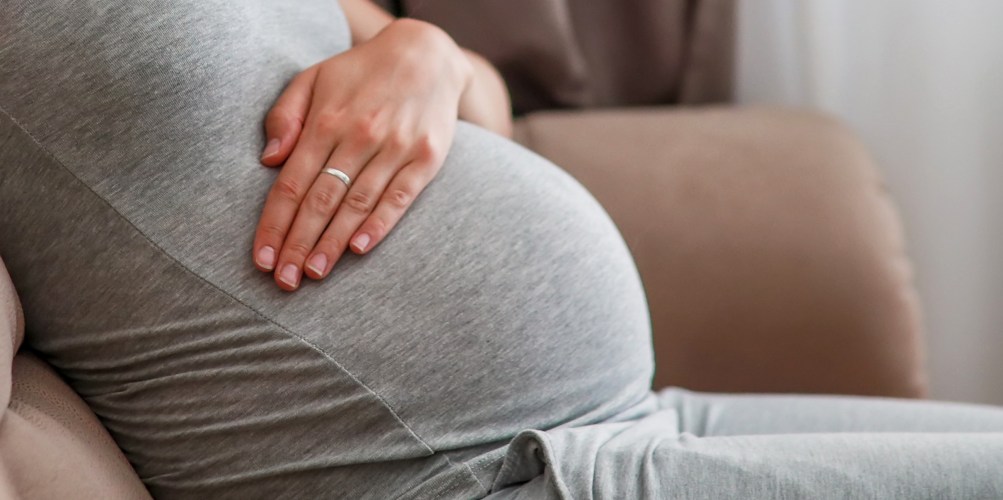 Pregnant woman on couch