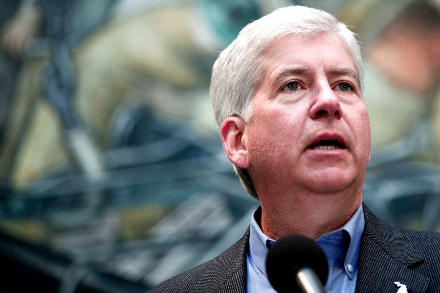 Michigan Gov. Rick Snyder speaks at a press conference at the Detroit Institute of Arts June 9, 2014 in Detroit, Mich. (Photo by Bill Pugliano/Getty)