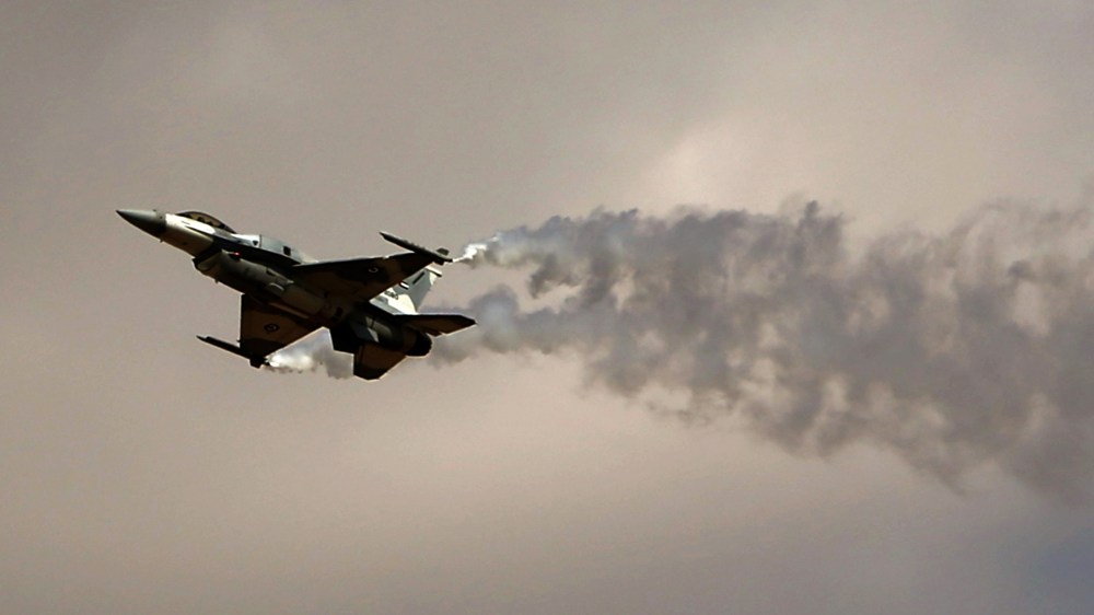 A General Dynamics F-16 Fighting Falcon jet belonging to the United Arab Emirates (UAE) Air Force performs during the Dubai Airshow on Nov. 18, 2013, in Dubai. (Photo by Marwan Naamani/AFP/Getty)