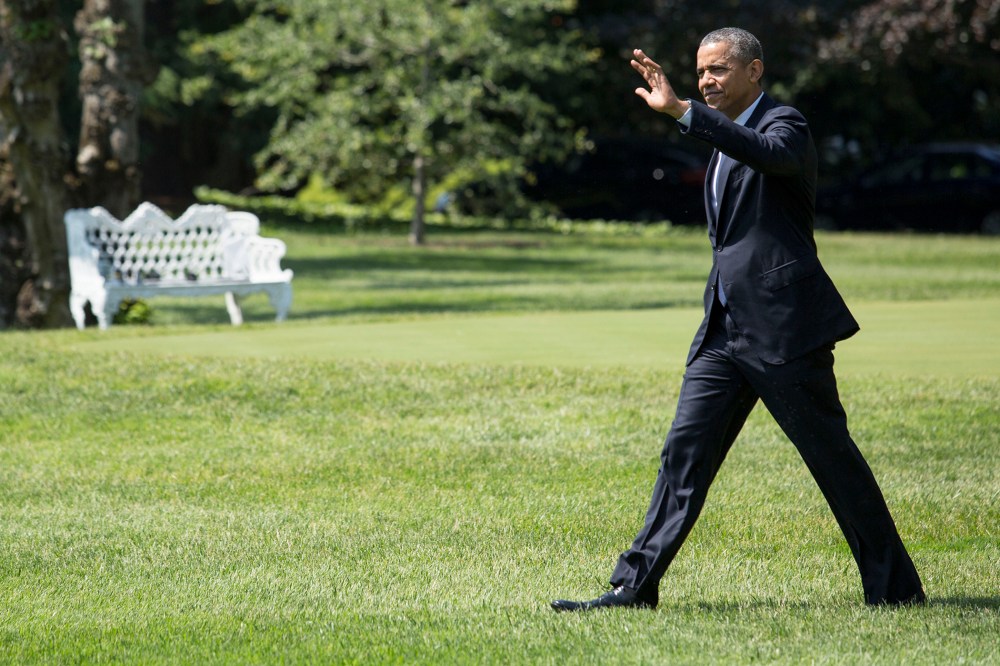 U.S. President Barack Obama walks toward Marine One on the South Lawn of the White House, on June 17, 2014.