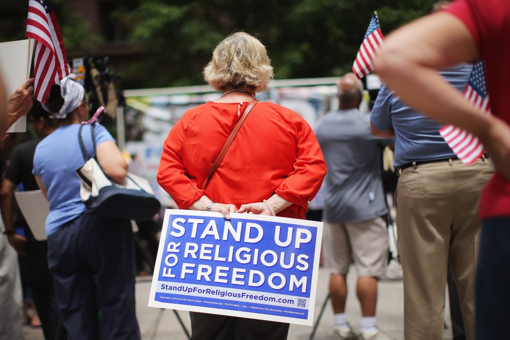 Religious freedom supporters hold a rally on June 30, 2014 in Chicago, Ill. (Photo by Scott Olson/Getty)