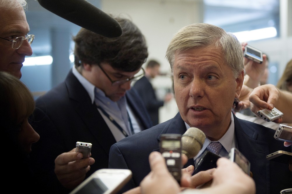 US Senator Lindsey Graham, R-SC, talks to reporters on Capitol Hill in Washington, DC on July 8, 2014.