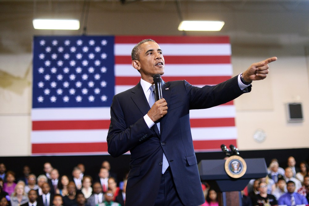 President Barack Obama speaks during a town hall meeting in Washington, DC, on July 21, 2014. (Photo by Jewel Samad/AFP/Getty)
