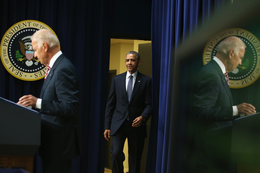 U.S. President Barack Obama is introduced by U.S. Vice President Joseph Biden before signing the Workforce Innovation and Opportunity Act on July 22, 2014 in Washington, DC.