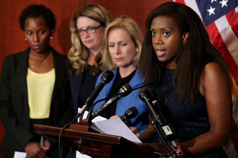 Wagatwe Wanjuki speaks about being a campus sexual assault survivor with Sen. Kristen Gillibrand and fellow survivors Annie Clark and Tre'Shonda Sheffey during a news conference at the US Capitol, July 30, 2014. (Photo by Chip Somodevilla/Getty)